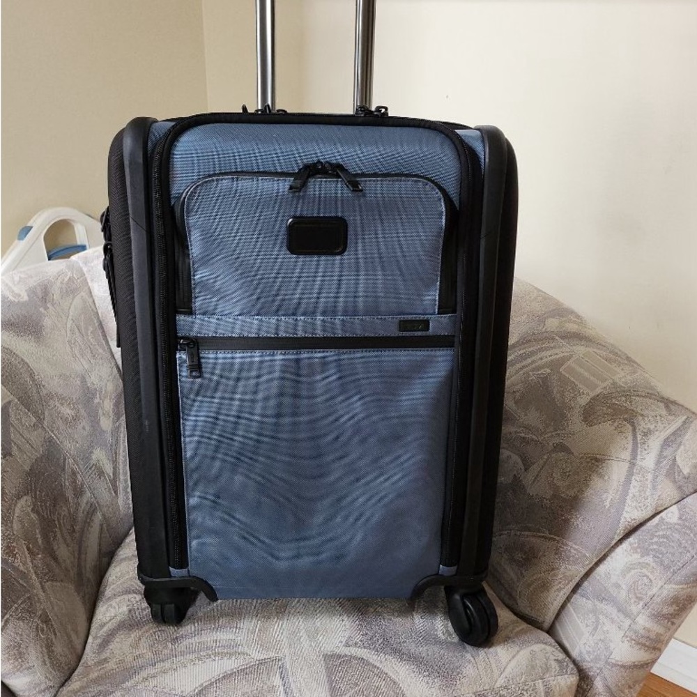 Alpha international 26 inch expandable wheeled carry-on by Tumi